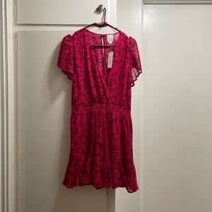 Selling Francesca’s jumpsuit. Color is Magenta with a dark blue floral pattern.